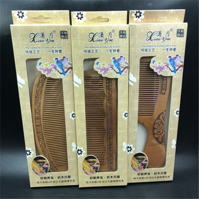 High-quality goods source manual round tooth peachwood comb natural carved anti-static creative gifts