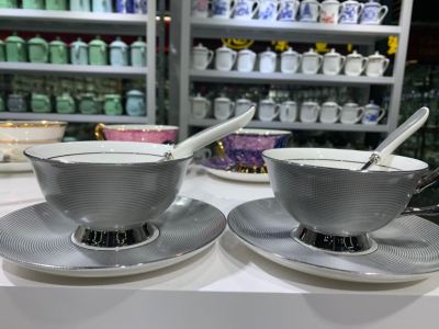 Bright grey coffee cup and saucer fire hotel supplies