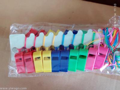 Coloured plastic whistle