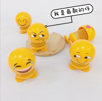 Shake sound with a creative shake head doll doll spring people put pieces car shake head doll cute emoticons