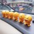 Shake sound with a creative shake head doll doll spring people put pieces car shake head doll cute emoticons
