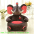 A cartoon character of a plush couch couch couch cushion for children