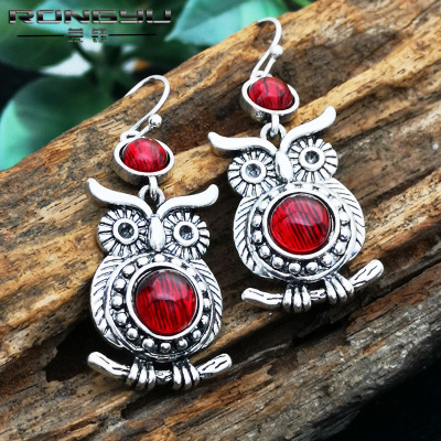 Rongyu wish hot new retro Thai silver owl earrings European and American inlaid ruby engagement earrings female