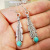 2019 Rongyu New European and American Court Vintage Turquoise Feather Earrings Plated S925 Silver Long Earrings Manufacturer