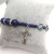 Blue beads Blue Madonna heart-shaped bead Jesus Christ cross hand bracelet at one end of the rosary