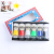 Top grade paper box with mixed color plastic handle brush
