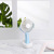 The new rotate hand-held fan with a small outdoor mini USB charging base LED night light fan