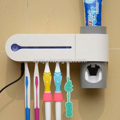 Two-in-one uv sterilizing toothbrush holder automatic toothpaste squeezer germicidal sterilizer toothbrush holder set