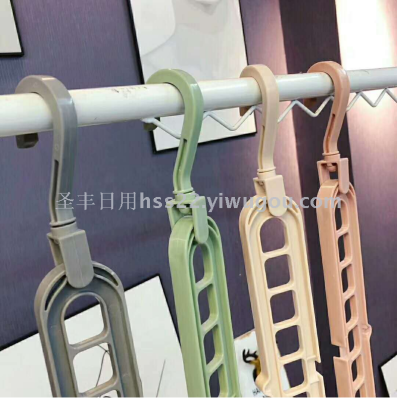 Douyin with a 9 - hole multi - functional magic hanger drying rack dormitory students storage god - ware telescopic fold