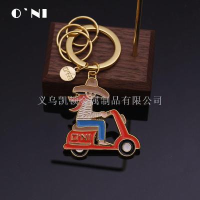 Creative cartoon motorcycle girl key chain fashionable lady bag metal drop oil personality bag pendant gift