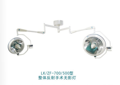 Surgical shadowless lamp with integral reflector