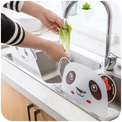 Domestic sink splash baffle suction baffle