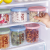 Food storage can be stacked in the kitchen with transparent sealed food storage box