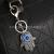 New Personalized Alloy Rhinestone Devil's Eye Keychain Creative Hollow Coin Purse Package Pendant Blue Eyes Series