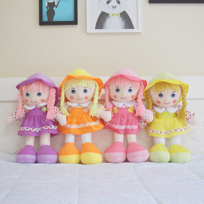 On the bed of baby girl doll set a princess grab toy