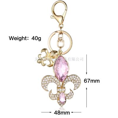 Europe and America hot selling metal crystal warbling tail flower key chain creative luggage pendant custom gifts