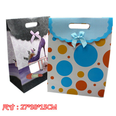 Manufacturers direct gift packaging bag flip bow gift paper bag hand-held paper bag sticky buckle bag