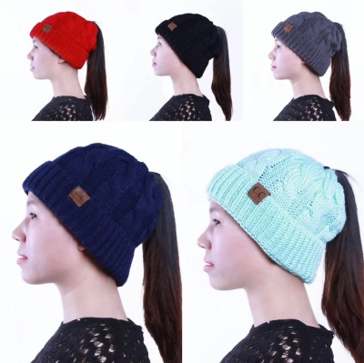 Aliexpress amazon hot style hats foreign trade twist pony tail hats autumn and winter women's warm knit hats
