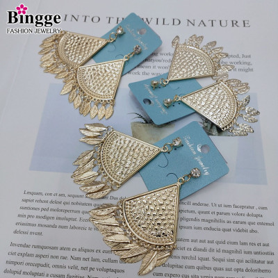 European and American retro fashion fan - fringed zircon earrings new hollow shape earrings a variety of pendant earrings