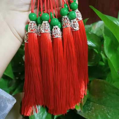 Yiwu buy low price wholesale with bead metal hollow pattern musical instrument fan pendant tassel