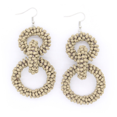 European and American cross - border new rice bead weaves earring national wind restores ancient ways circular exaggerated hand string bead eardrop earring is acted the role of