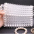 The new transparent acrylic beads woven handbag in 2019 is decorated with exquisite hand - made beaded beads