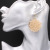 European and American retro crystal woven flower earrings female Korean fashion metal beaded earrings creative earrings