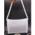 The new transparent acrylic beads woven handbag in 2019 is decorated with exquisite hand - made beaded beads