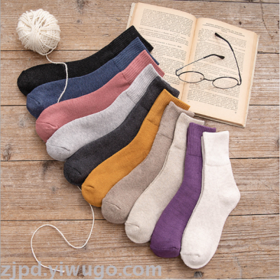 The new autumn/winter collection of solid colour terry socks for women's middle stockings has a thick warm top