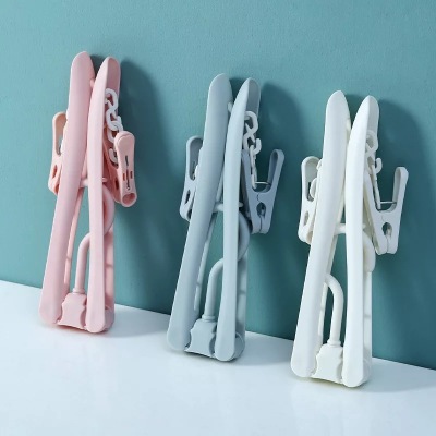 Manufacturer direct sale contracted fold clothes rack outdoor travel household multifunction magic clothes rack antiskid clothes rack clip