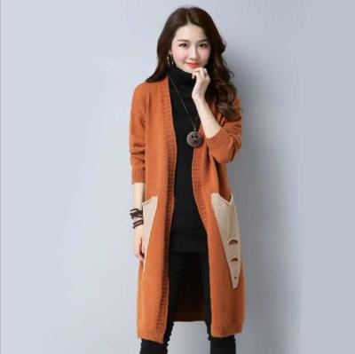 The new autumn/winter 2019 Korean version of The mid-length sweater loose hole pocket color long sleeve fashion sweater women