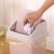 Plastic Garbage can household toilet sitting upturned paper basket the toilet has a lid on the kitchen Garbage can