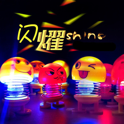 Luminescent expression minions shake his head shake his head bounce car display car creative spring car act the role of tik sound