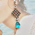 Rong Yu Fashion Fresh Ocean Blue Topaz Earrings Bohemian Style Plated 925 Ancient Silver Mesh Ear Pendant Female