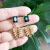 Rong Yuomei Creative Palm Leaf Stud Earrings Fashion Emerald Bohemian Holiday Temperament Earrings Jewelry