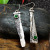 Rong Yu Wish Hot Selling Style S925 Vintage Thai Silver Sickle Serrated Ear Pendant Inlaid Green Chalcedony Creative Earrings