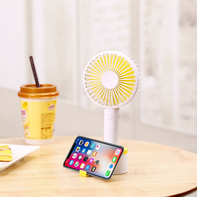 The new innovation only love USB charging with mobile phone support desktop fan portable handheld outdoor fan
