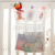 Children's bathroom toys receive hanging bags