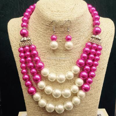In Europe, America, Africa and South America, the most popular suit is exaggerated three - layer of pearl necklace and necklace earrings set for ladies