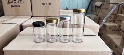 Glass jam jar with high lid