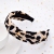 Amazon exaggerated leopard pattern hair band retro cross hair band creative cloth art knot headband female temperament hair accessories Europe and America