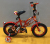 14-inch camo kids bike leho bike with an updated backseat color basket