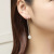 Manhuini Artificial Cat Eye Earrings Women's Sterling Silver Needle Long Earrings Korean Simple Graceful Tassel Hanging Earrings Wholesale