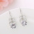 Manhuini Love Heart Earrings Women's Bow Pendant Bow Tie Heart Shaped South Korea Beautiful Ear Hook Factory Wholesale