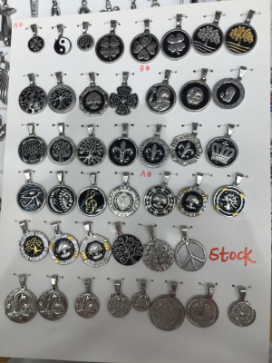 Many stainless steel pendants in stock