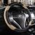 Automobile steering wheel cover wholesale full leather car protective cover to cover the four seasons general round wear