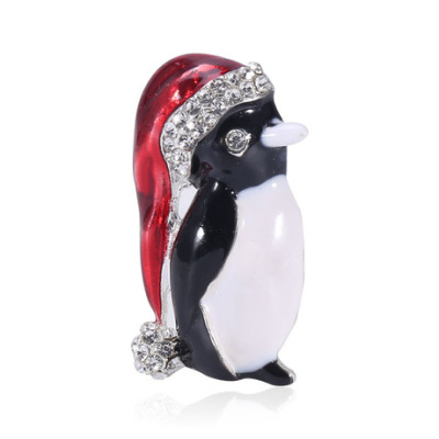 A new fashion cartoon cartoon cute animal brooch sells like hot cakes everything accessory alloy drop oil Santa hat penguin brooch