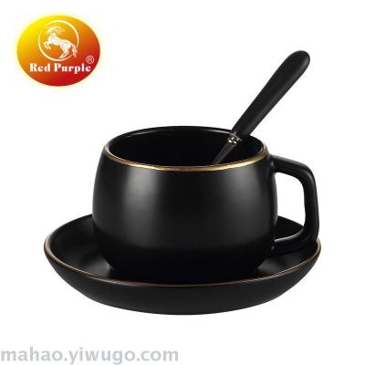 Ceramic coffee cup and saucer with spoon