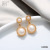 Korea simple fashion alloy earrings creative pearl enabsorption personality accessory manufacturers direct sales