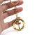 Golden revolving crucifix keyring pendant ring ring ornaments religious church gifts gifts